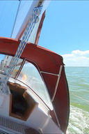Cockpit view of heeling sailboat